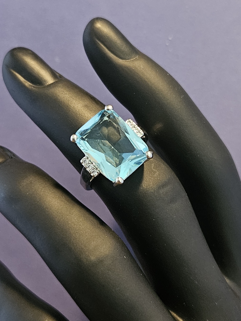 Elegant Sterling Silver Ring with Emerald Cut Blue Topaz Sz 7.25